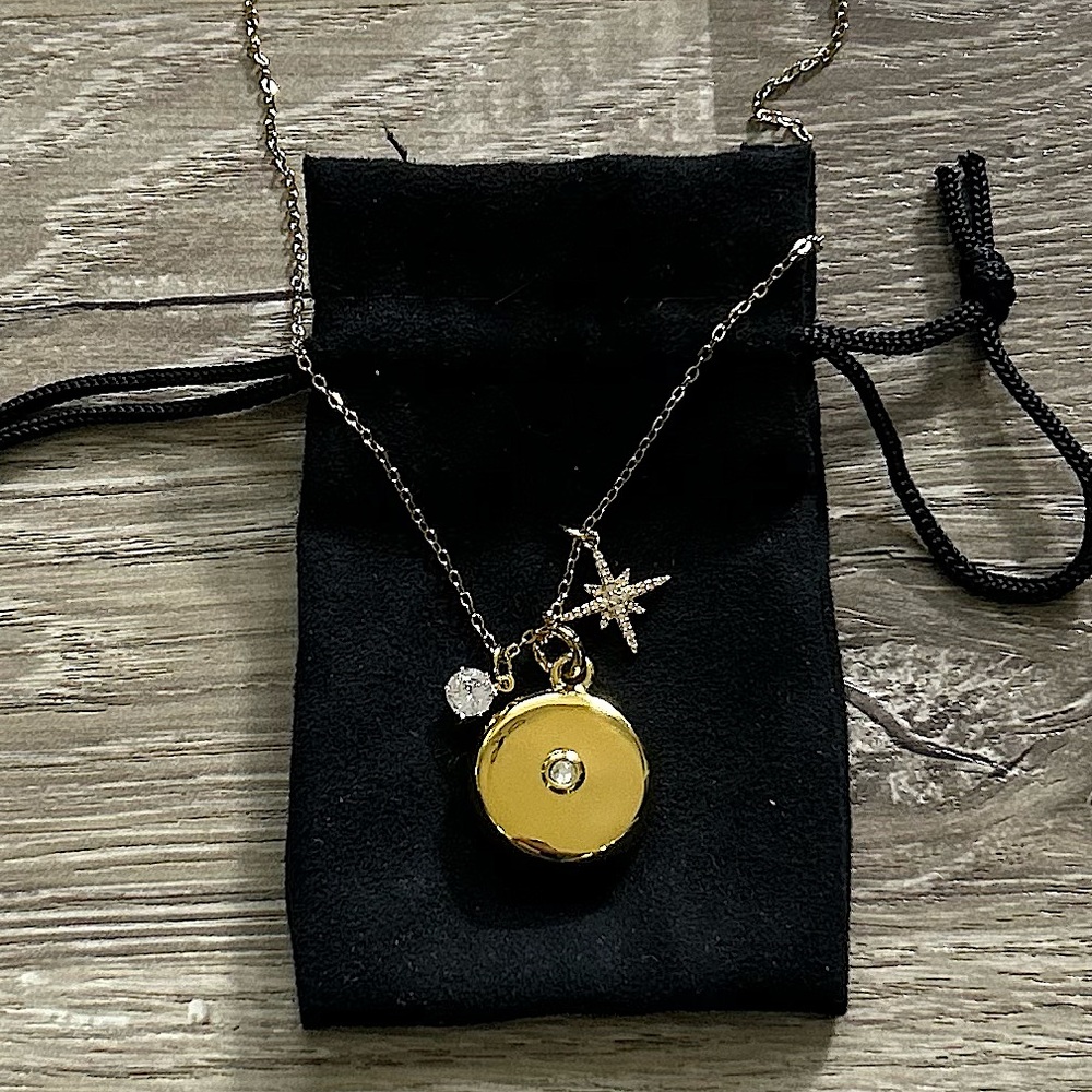 NIB Invisawear Gold Starburst Charm Necklace with Crystal Pendant